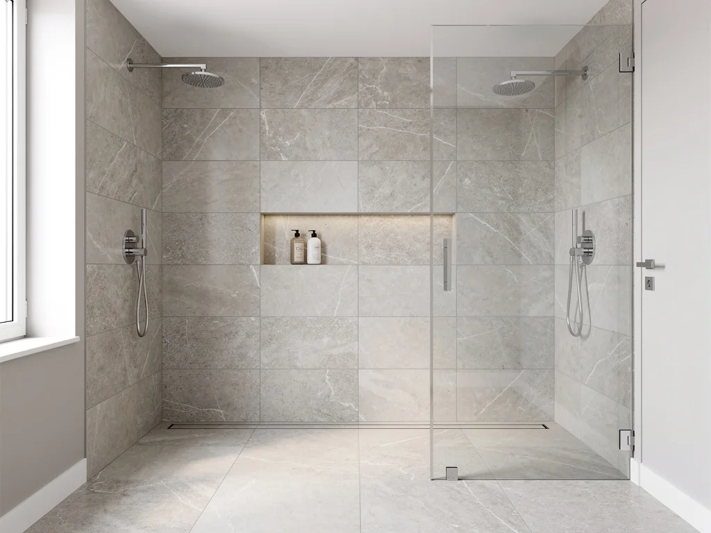 Douche à l'italienne carrelée grand format avec paroi vitrée et receveur de plain-pied